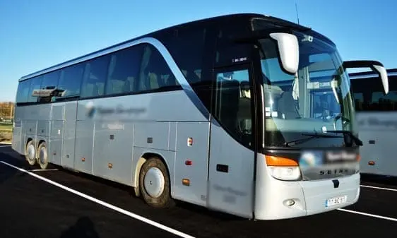 Spacious 59-seater coach ready for group travel in Paris